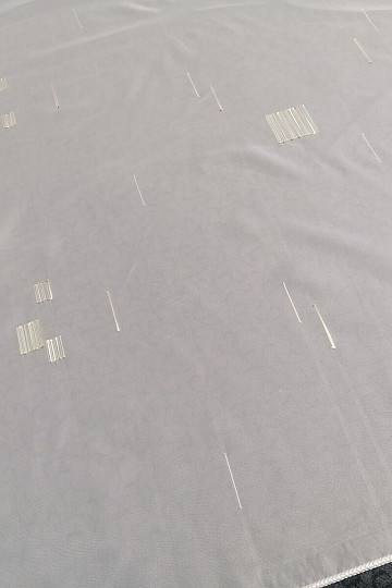 White veil curtain with green-beige embroidery