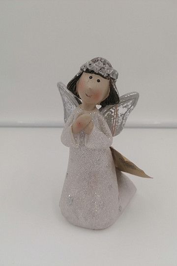 Angel Bulík kneeling, praying