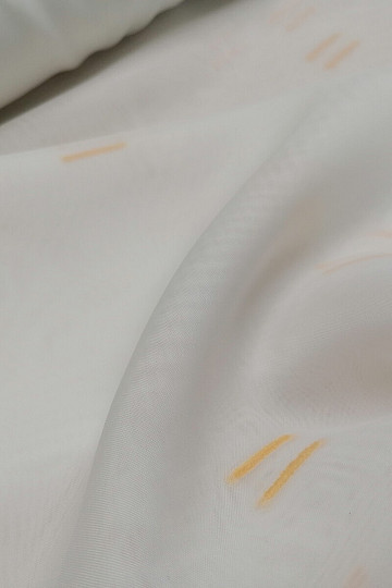 Light cream voal curtain with light orange stitched lines