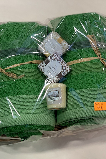 Gift set of towels in a wicker tray wrapped in cellophane - green