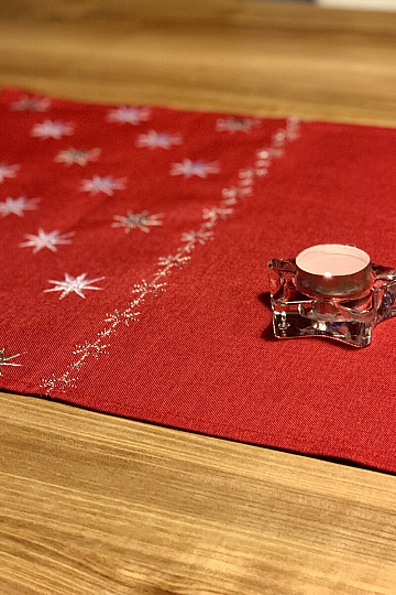 Red embroidered Christmas tablecloth with stars