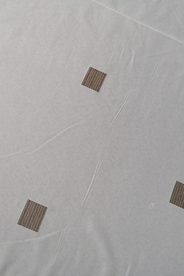 Voile curtain with brown cubes