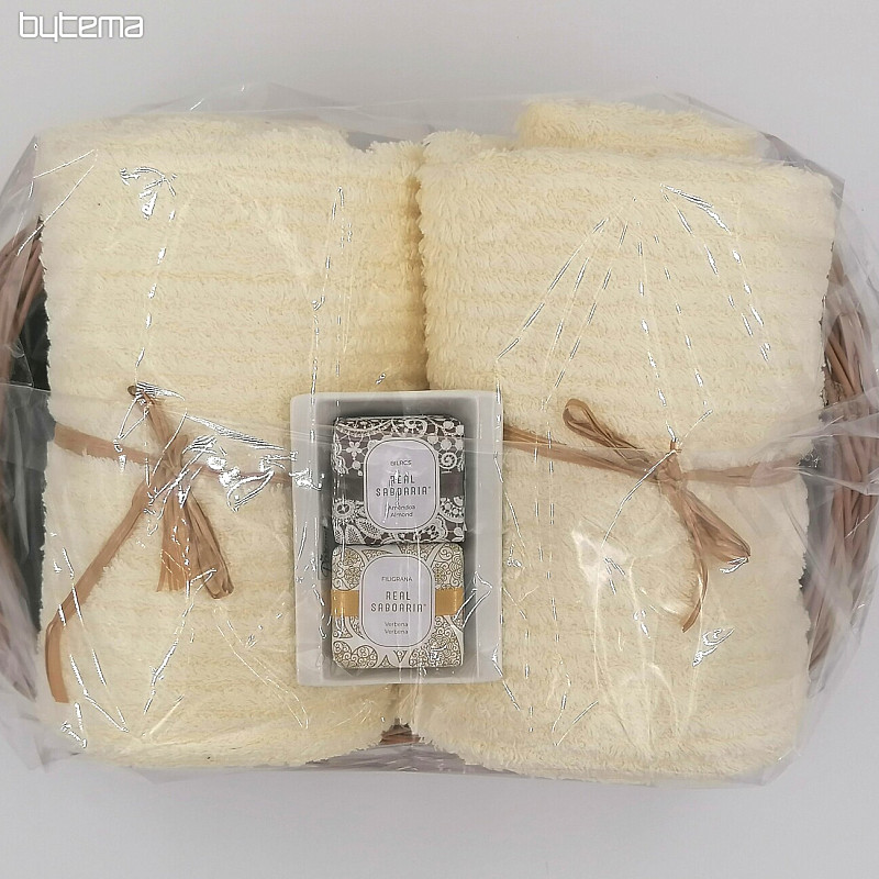 Gift set of towels in a wicker tray wrapped in cellophane - cream