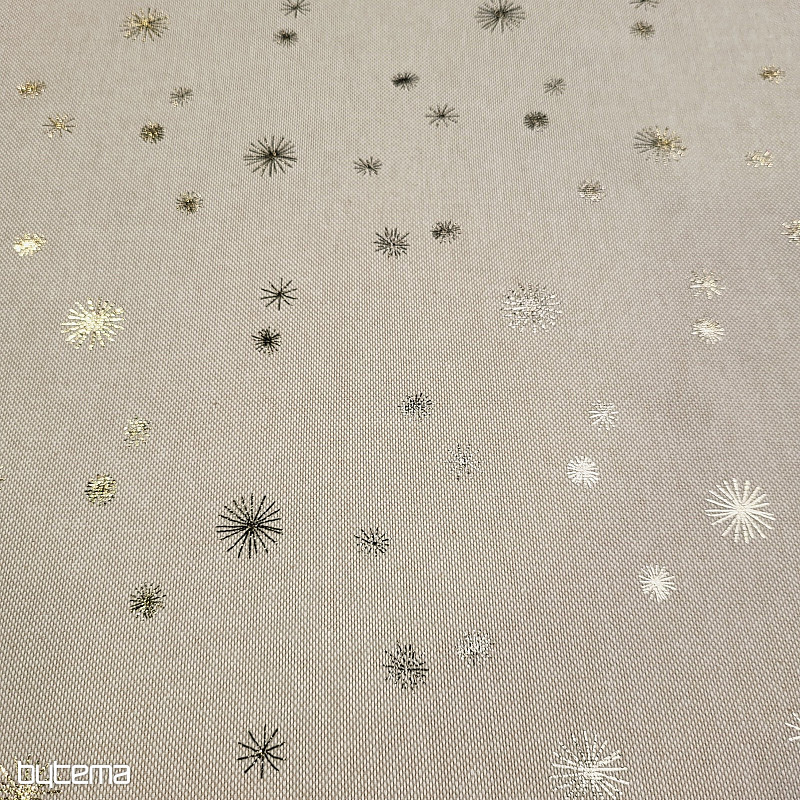 Cotton CANVAS fabric GOLDEN STARS on the cutting board