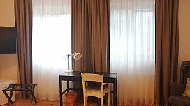 Draperies and curtains in the rooms of Hotel McLimon