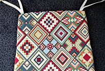 Seat cushions made from tapestry Aztec