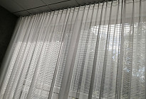 A curtain in the office of the Agel insurance company