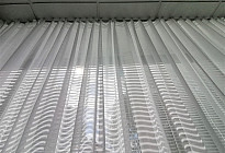 A curtain in the office of the Agel insurance company