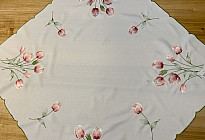 Embroidered tablecloths with spring motifs