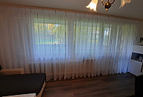 Modern curtain Gerster 11280 in the living room