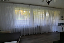Modern curtain Gerster 11280 in the living room