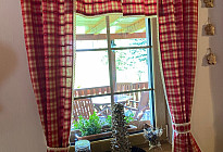 Curtains and tablecloths in the guesthouse Pod Šerákem