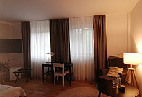 Draperies and curtains in the rooms of Hotel McLimon