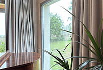 Family house - installation of tracks and decorative blackout curtains