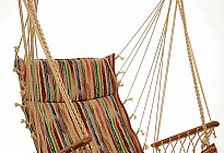 Hanging rocking chair from Czech company Alebo  from tapestry fabrics