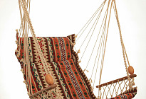 Hanging rocking chair from Czech company Alebo  from tapestry fabrics