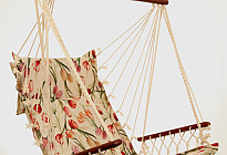 Hanging rocking chair from Czech company Alebo  from tapestry fabrics