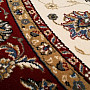 Woolen round carpet ORIENT cream, burgundy hem