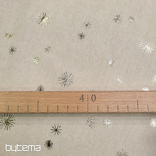 Cotton CANVAS fabric GOLDEN STARS on the cutting board