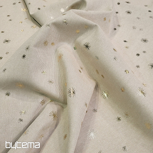 Cotton CANVAS fabric GOLDEN STARS on the cutting board